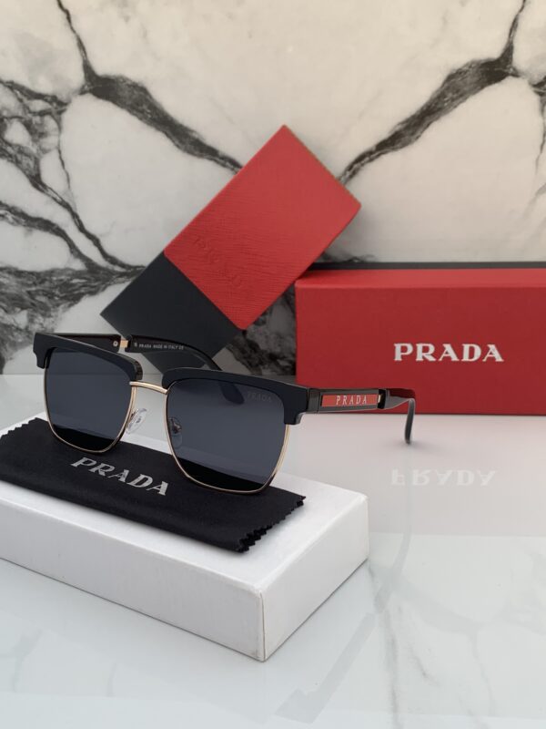 PRADA_CLUB_BLACK_GOLD